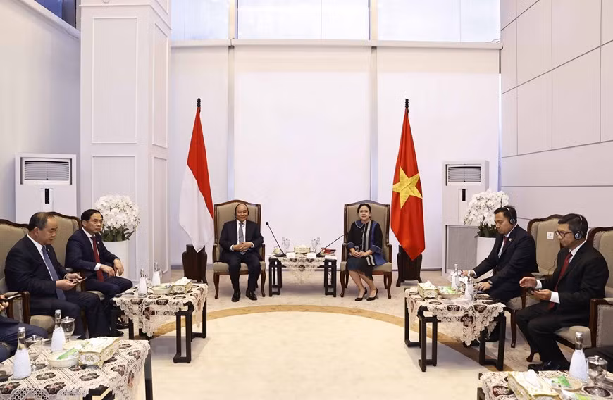 Chủ tịch nước Nguyễn Xuân Phúc hội kiến Chủ tịch Hội đồng Đại biểu nhân dân Indonesia, bà Puan Maharani. (Ảnh: Thống Nhất/TTXVN)