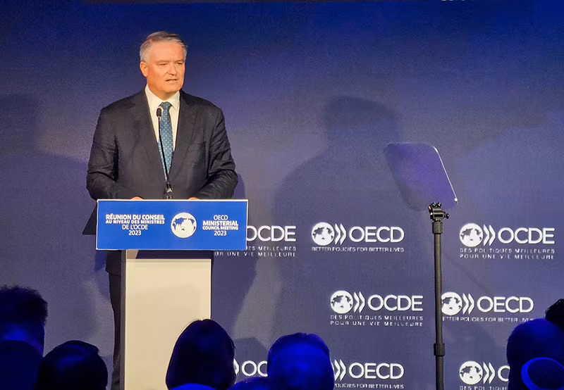 Tổng thư ký OECD Mathias Cormann phát biểu khai mạc hội nghị. (Ảnh: MINH DUY)