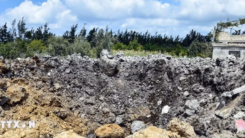 (Tư liệu) Cảnh tàn phá sau một cuộc không kích ở thành phố Tartus, Syria, ngày 2/7/2022. (Ảnh: AFP/TTXVN)