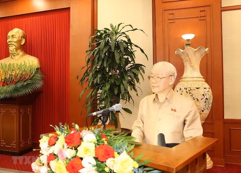 Tổng Bí thư Nguyễn Phú Trọng nói chuyện với các đại biểu dự buổi gặp mặt. (Ảnh: Trí Dũng/TTXVN)