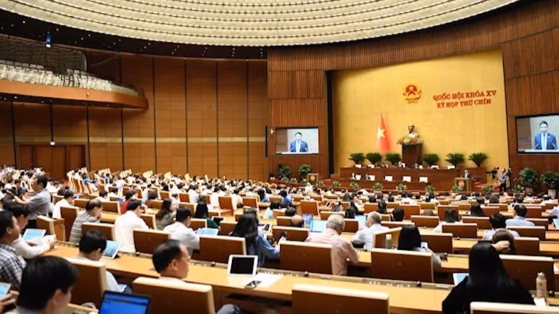 Quốc hội làm việc tại hội trường nghe Tờ trình và Báo cáo dự án Luật sửa đổi, bổ sung một số điều của Luật Doanh nghiệp. (Ảnh: DUY LINH)