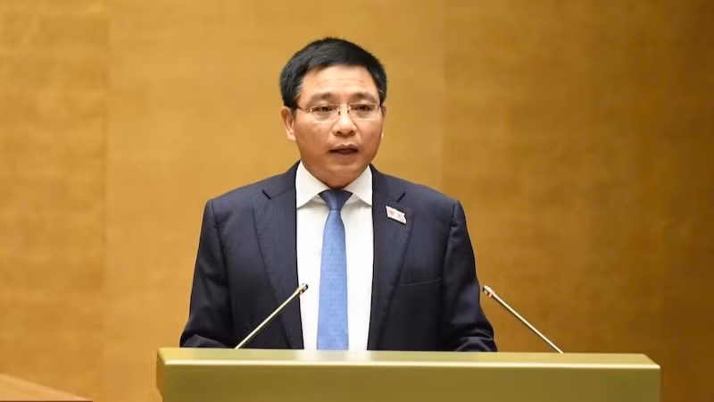 Bộ trưởng Tài chính Nguyễn Văn Thắng trình bày Tờ trình của Chính phủ về dự án Luật sửa đổi, bổ sung một số điều của Luật Doanh nghiệp. (Ảnh: DUY LINH)