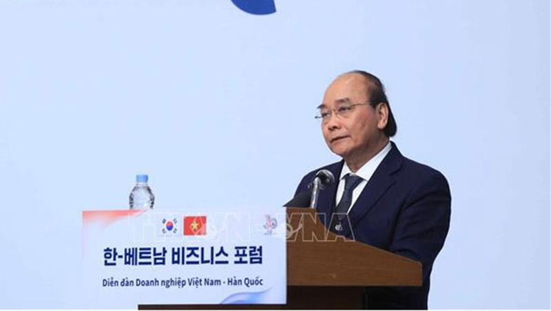 Chủ tịch nước Nguyễn Xuân Phúc phát biểu tại diễn đàn. (Ảnh: Thống Nhất/ TTXVN)