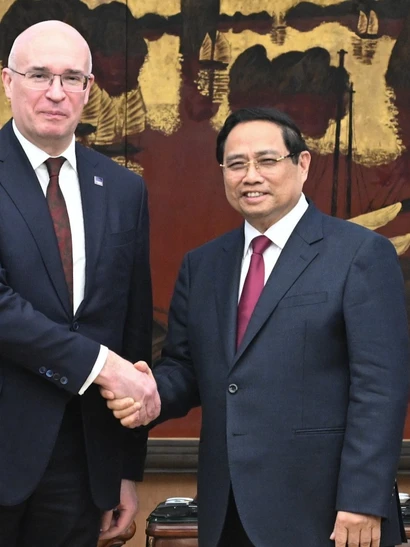 Thủ tướng Phạm Minh Chính đón Tổng Giám đốc Hãng thông tấn TASS (LB Nga) Andrey Kondrashov.