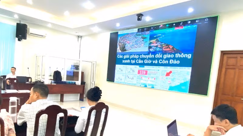 Các đơn vị trao đổi về Đề án kiểm soát khí thải phương tiện giao thông trên địa bàn Thành phố Hồ Chí Minh. (Ảnh: QUÝ HIỀN)