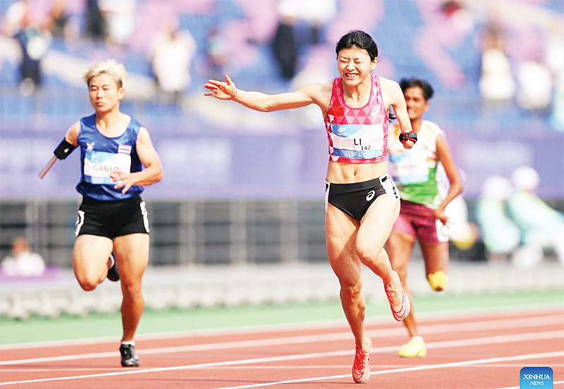 VĐV Trung Quốc Li Lu giành HCV chạy 100m nữ hạng T47. (Ảnh XINHUA) 