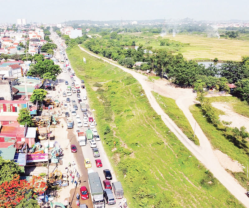 Dự án cải tạo, nâng cấp Quốc lộ 6, đoạn Ba La - Xuân Mai đang được huyện Chương Mỹ tập trung giải phóng mặt bằng. (Ảnh BẢO NHI)