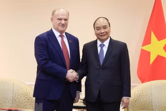 Chủ tịch nước Nguyễn Xuân Phúc tiếp Chủ tịch Đảng Cộng sản Liên bang Nga Gennady Zyuganov. (Ảnh: Thống Nhất/TTXVN)