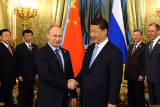 Tổng thống Nga Vladimir Putin và Chủ tịch Trung Quốc Tập Cận Bình. (Nguồn: TASS/TTXVN)