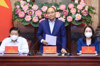 Chủ tịch nước Nguyễn Xuân Phúc phát biểu tại cuộc họp. (Ảnh: Thống Nhất/TTXVN)