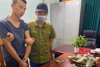 Đối tượng Phan Minh Châu bị công an bắt giữ.