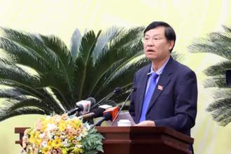 Chánh án Tòa án nhân dân Thành phố Hà Nội Nguyễn Hữu Chính phát biểu tại HĐND thành phố Hà Nội. 