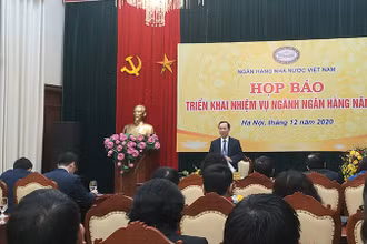 Phó Thống đốc thường trực NHNN Đào Minh Tú chủ trì cuộc họp báo