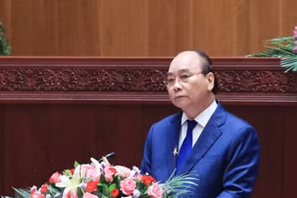 Chủ tịch nước Nguyễn Xuân Phúc phát biểu tại Kỳ họp lần thứ nhất, Quốc hội Lào khóa IX. (Ảnh: TTXVN)