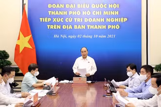 Chủ tịch nước Nguyễn Xuân Phúc phát biểu tại điểm cầu Hà Nội. (Ảnh: Thống Nhất/TTXVN)