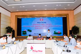 Chủ tịch UBND tỉnh Đồng Tháp Phạm Thiện Nghĩa phát biểu tại hội nghị.