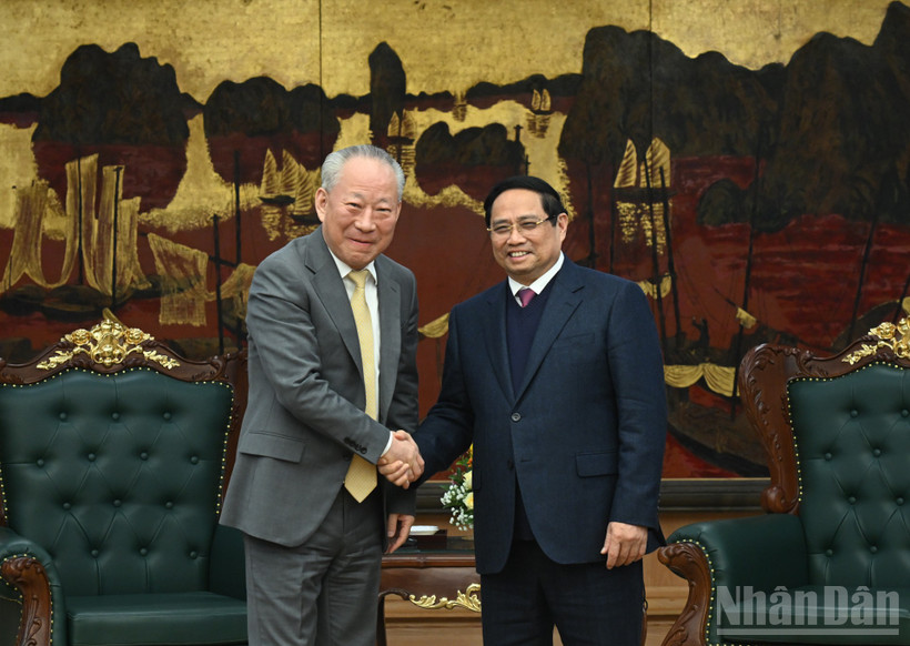 Thủ tướng Phạm Minh Chính đón ông Nghiêm Giới Hòa, người sáng lập Tập đoàn xây dựng Thái Bình Dương.