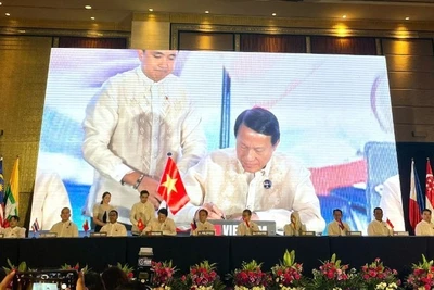 Đại tướng Lương Tam Quang, Ủy viên Bộ Chính trị, Bộ trưởng Công an Việt Nam tại lễ ký kết. 