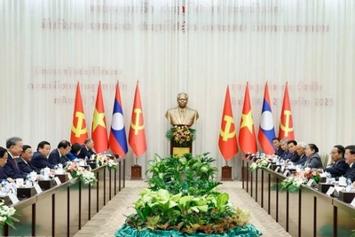 Tổng Bí thư Tô Lâm và Tổng Bí thư, Chủ tịch nước Lào Thongloun Sisoulith đồng chủ trì Cuộc gặp cấp cao giữa Đảng Cộng sản Việt Nam và Đảng Nhân dân Cách mạng Lào. (Ảnh: Thống Nhất/TTXVN) 