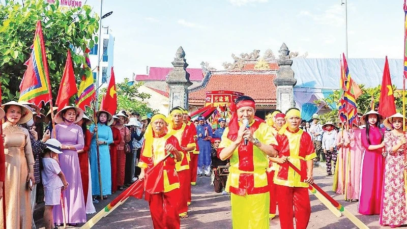 Tổ chức lễ truy điệu và an táng 80 hài cốt liệt sĩ quân tình nguyện và chuyên gia Việt Nam hy sinh tại lào
