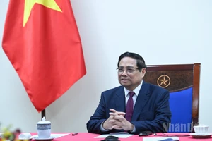 Thủ tướng Chính phủ Phạm Minh Chính điện đàm với Thủ tướng Algeria Sifi Ghrieb. (Ảnh: Trần Hải)