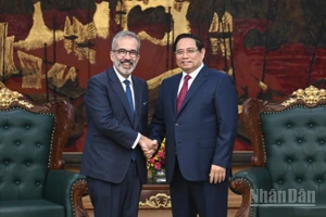 Thủ tướng Chính phủ Phạm Minh Chính và Bộ trưởng Quốc vụ, Bộ trưởng Ngoại giao Bồ Đào Nha Paulo Rangel. (Ảnh: TRẦN HẢI)