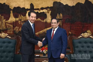 Thủ tướng Chính phủ Phạm Minh Chính và Đại sứ Trung Quốc tại Việt Nam Hà Vĩ. (Ảnh: Trần Hải)