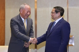 Thủ tướng Phạm Minh Chính tiếp Chủ tịch Tập đoàn xây dựng Thái Bình Dương Nghiêm Giới Hòa. (Ảnh: NHẬT BẮC/VGP)