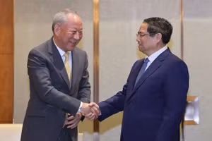 Thủ tướng Phạm Minh Chính tiếp Chủ tịch Tập đoàn xây dựng Thái Bình Dương Nghiêm Giới Hòa. (Ảnh: NHẬT BẮC/VGP)