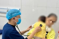 Bệnh nhi mắc cúm A điều trị tại Bệnh viện Nhiệt đới Trung ương. Ảnh: THANH SƠN