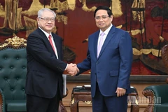 Thủ tướng Phạm Minh Chính và ông Nishimura Teiichi-Chủ tịch Hội hữu nghị Nhật Bản-Việt Nam vùng Kansai. 