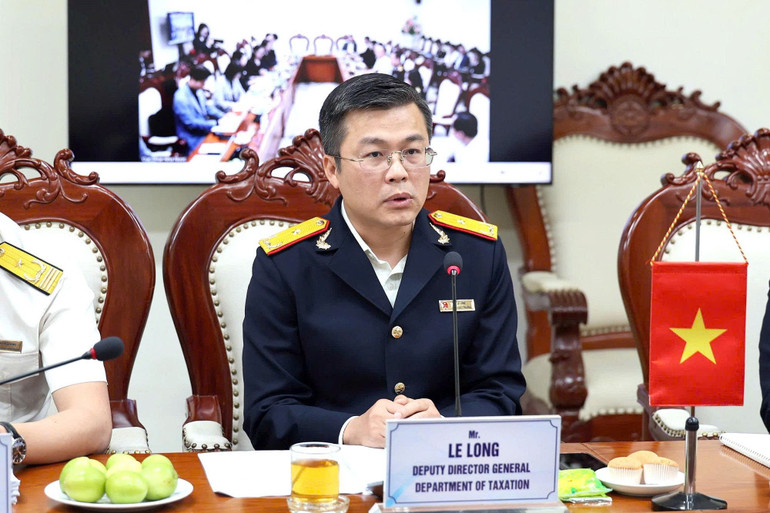 Phó Cục trưởng Cục Thuế Lê Long phát biểu khai mạc hội thảo