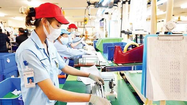 Hoạt động sản xuất tại Khu công nghiệp Nội Bài, Hà Nội. (Ảnh PHẠM HÙNG)