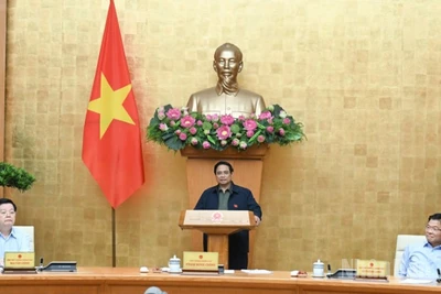 Thủ tướng Chính phủ Phạm Minh Chính chủ trì cuộc họp về đánh giá tình hình thực hiện mô hình chính quyền địa phương 2 cấp. (Ảnh: TRẦN HẢI)