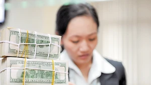 Tỷ giá và niềm tin thị trường