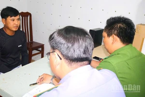 Trần Thanh Nhàn tại cơ quan công an.