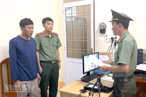 Trần Phước Lợi tại cơ quan Công an.