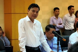 Phó Tổng cục trưởng Tổng cục Môi trường Hoàng Văn Thức trả lời tại buổi họp báo ngày 14-10.