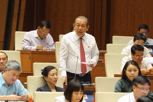 Phó Thủ tướng Thường trực Chính phủ Trương Hòa Bình tham gia giải trình tại phiên chất vấn. Ảnh: TRẦN HẢI.