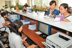 Ứng dụng công nghệ thông tin giúp tối ưu hóa quá trình quản lý bệnh án của bệnh nhân tại Bệnh viện K, Tân Triều (Hà Nội). Ảnh: ĐỨC ANH