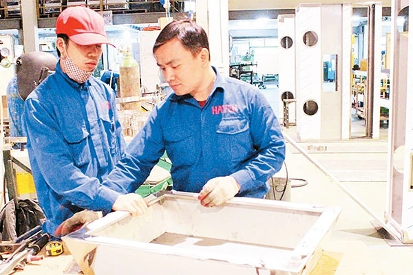 Phân xưởng sản xuất bếp ăn công nghiệp của Công ty cổ phần Hà Yến (Khu công nghiệp hỗ trợ Nam Hà Nội). Ảnh: KHẮC KIÊN