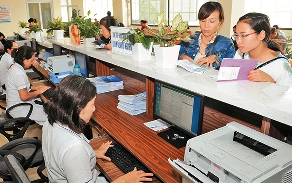 Ứng dụng công nghệ thông tin giúp tối ưu hóa quá trình quản lý bệnh án của bệnh nhân tại Bệnh viện K, Tân Triều (Hà Nội). Ảnh: ĐỨC ANH