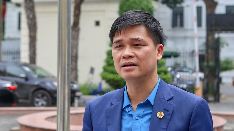 Phó Chủ tịch Tổng Liên đoàn Lao động Việt Nam, Phó Chủ tịch Hội đồng Tiền lương Quốc gia Ngọ Duy Hiểu trả lời báo chí. img-0967.jpg