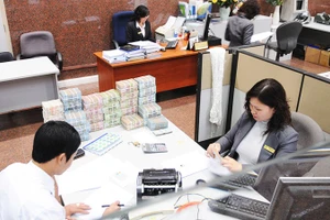 Vietcombank đã gửi thư mời các đơn vị tư vấn tham gia báo giá dịch vụ thẩm định giá độc lập cho đợt phát hành cổ phiếu riêng lẻ. Ảnh: NAM ANH