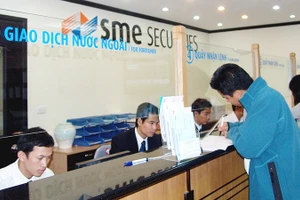 Sự trở lại của khối nước ngoài với các phiên mua ròng mạnh gần đây càng tiếp thêm niềm tin cho thị trường. Ảnh: NAM ANH