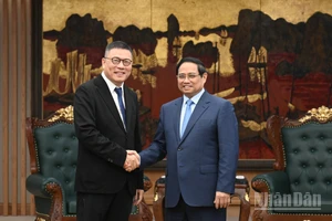 Thủ tướng Phạm Minh Chính và ông Hồng Thiên Chúc, Chủ tịch Tập đoàn Texhong (Trung Quốc).