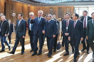 Thủ tướng Phạm Minh Chính cùng Đoàn đại biểu cấp cao Việt Nam đến thăm, làm việc với tập đoàn Novatek. (Ảnh: VGP)