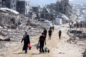 Người dân Palestine tại Dải Gaza. (Ảnh: THX/TTXVN)