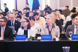 Các đại biểu dự Lễ công bố Báo cáo Kinh tế Việt Nam 2025.