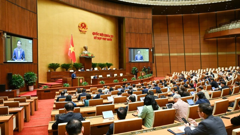 Quốc hội làm việc tại hội trường, nghe Tờ trình và Báo cáo thẩm tra dự án Luật sửa đổi, bổ sung một số điều của Luật Quản lý nợ công. (Ảnh: DUY LINH)